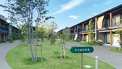 もりねき住宅中庭。公園とひと続きになっている住民たちの憩いの場